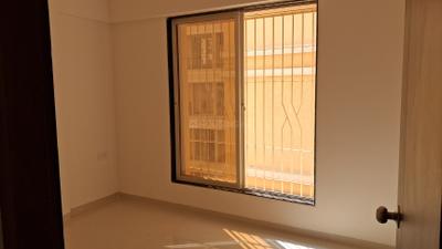 Bedroom Image of 620 Sq.ft 1 BHK Apartment / Flat for rent in Rkr Precious Empire Wing D E And F, Ambernath East Ambernath for Rs. 8000