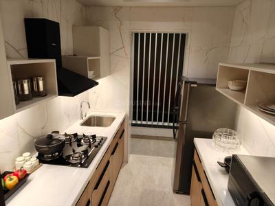 Kitchen Image of 938 Sq.ft 2 BHK Apartment / Flat for sale in Runwal The Central Park, Chinchwad Pune for Rs. 12500000