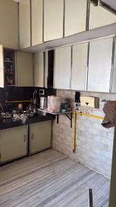 Kitchen Image of 1180 Sq.ft 2 BHK Apartment / Flat for sale in Majura Gate Surat for Rs. 4200000