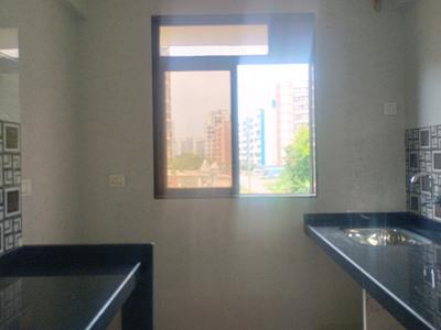 Kitchen Image of 675 Sq.ft 1 BHK Apartment / Flat for sale in Amrut Laxmi Raj Regalia Phase I, Ambernath East Ambernath for Rs. 2400000