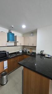 Kitchen Image of 930 Sq.ft 1 BHK Apartment / Flat for sale in Central Park The Room, Sector 48 Gurgaon for Rs. 28000000