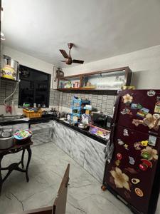 Kitchen Image of 1250 Sq.ft 3 BHK Duplex for sale in Kopar Khairane Navi Mumbai for Rs. 14500000