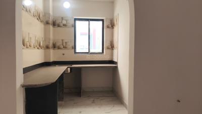 Kitchen Image of 879 Sq.ft 2 BHK Apartment / Flat for sale in Madhyamgram Kolkata for Rs. 3516000