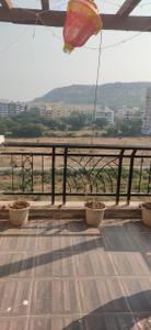 Balcony Image of 650 Sq.ft 1 BHK Apartment / Flat for sale in Windsor Maple Woodz, Wagholi Pune for Rs. 2700000