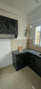 Kitchen Image of 663 Sq.ft 2 BHK Apartment / Flat for rent in Urbanrise Revolution One, Padur Chennai for Rs. 20000