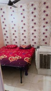 Bedroom Image of KIRAT PG in Tilak Nagar, New Delhi