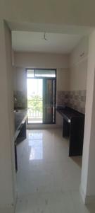 Kitchen Image of 958 Sq.ft 2 BHK Apartment / Flat for sale in Nishi Apurva Ratn, Kalyan West Kalyan for Rs. 7500000