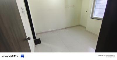 Bedroom Image of 750 Sq.ft 2.5 BHK Apartment / Flat for rent in Shruti Pushp, Kiwale Pune for Rs. 17000