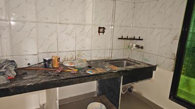 Kitchen Image of 650 Sq.ft 1 BHK Apartment / Flat for sale in Om Sai Complex Phase - II, Badlapur East Badlapur for Rs. 2800000