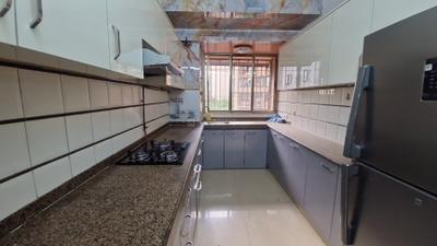 Kitchen Image of 1650 Sq.ft 3 BHK Apartment / Flat for sale in Ajmera Beverly Hills and Royal Empire, Andheri West Mumbai for Rs. 54500000