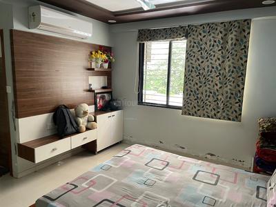 Bedroom Image of 850 Sq.ft 2 BHK Apartment / Flat for rent in Ayushyaman Elegance, Ghatlodiya Ahmedabad for Rs. 25000