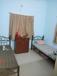 Bedroom Image of NAVYA PG SERVICE in Satellite, Ahmedabad