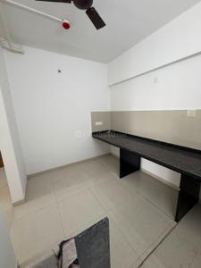 Kitchen Image of 950 Sq.ft 2 BHK Apartment / Flat for sale in Kosmic Kourtyard Phase 1, Wagholi Pune for Rs. 6200000