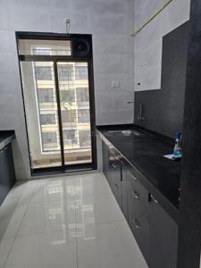Kitchen Image of 665 Sq.ft 1 BHK Apartment / Flat for sale in Om Swayambhu Siddhivinayak Balaji Residency, Thakurli Thane for Rs. 4800000