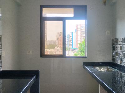 Kitchen Image of 628 Sq.ft 1 BHK Apartment / Flat for sale in Amrut Laxmi Raj Regalia Phase I, Ambernath East Ambernath for Rs. 2300000