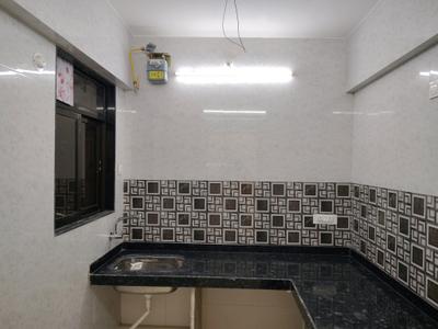 Kitchen Image of 550 Sq.ft 1 BHK Apartment / Flat for rent in Puraniks Home Town, Kasarvadavali Thane for Rs. 18999