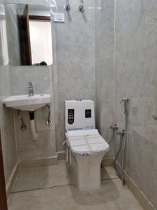 Common Bathroom Image of 600 Sq.ft 2 BHK Apartment / Flat for sale in Hans Builders Floor, Dwarka Mor New Delhi for Rs. 4100000