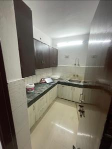 Kitchen Image of 650 Sq.ft 1 BHK Apartment / Flat for rent in Smriti Apartments, Sector 56 Gurgaon for Rs. 30000