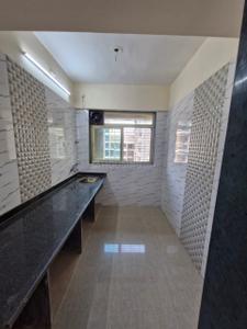 Kitchen Image of 600 Sq.ft 1 BHK Apartment / Flat for sale in Mohan Willows III, Badlapur East Badlapur for Rs. 2600000