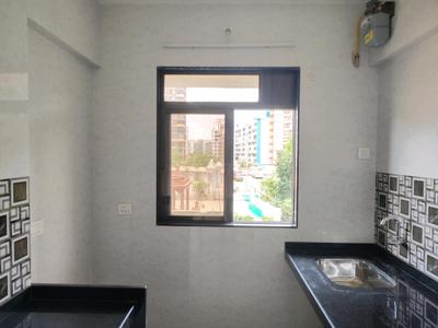 Kitchen Image of 480 Sq.ft 1 BHK Apartment / Flat for rent in Unique Greens, Kasarvadavali Thane for Rs. 17806