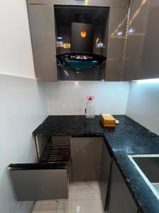 Kitchen Image of 850 Sq.ft 2 BHK Builder Floor for rent in Dwarka Mor New Delhi for Rs. 14000