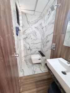 Bathroom Image of 824 Sq.ft 3 BHK Apartment / Flat for sale in Ashwamegh Elite, Sargasan Gandhinagar for Rs. 7900000