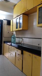Kitchen Image of 1150 Sq.ft 3 BHK Apartment / Flat for rent in Ashish Swapnalok Towers, Goregaon East Mumbai for Rs. 75000