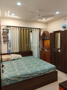 Bedroom Image of 1350 Sq.ft 3 BHK Apartment / Flat for sale in Krisna Nirmaan Amorapolis, Dhanori Pune for Rs. 9900000