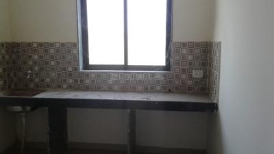 Kitchen Image of 550 Sq.ft 1 BHK Apartment / Flat for sale in Prakhhyat Yellow Tree, Kalambhe Thane for Rs. 1800000