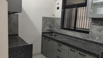 Kitchen Image of 900 Sq.ft 2 BHK Apartment / Flat for rent in Paradigm Antalya, Jogeshwari West Mumbai for Rs. 65000