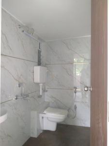 Common Bathroom Image of 625 Sq.ft 1 BHK Apartment / Flat for sale in Radha Nilaya Phase 2, Bapane Mumbai for Rs. 3200000