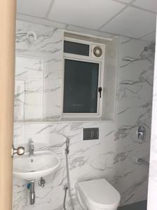 Common Bathroom Image of 1050 Sq.ft 2 BHK Apartment / Flat for sale in Lodha Primeir, Dombivli East Thane for Rs. 7600000