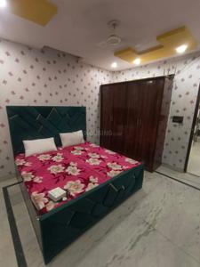 Bedroom Image of 950 Sq.ft 2 BHK Builder Floor for rent in Ramesh Nagar New Delhi for Rs. 28000