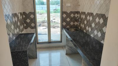 Kitchen Image of 715 Sq.ft 1 BHK Apartment / Flat for sale in Shilphata Thane for Rs. 3650000