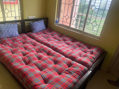 Bedroom Image of Kanhaiya girls pg in New Town, Kolkata