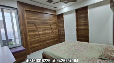 Bedroom Image of 1165 Sq.ft 3 BHK Apartment / Flat for sale in AP Aarya Kruti by AP Buildcon, Rohidaspra Rajkot for Rs. 9500000