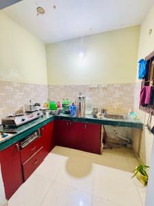 Kitchen Image of 750 Sq.ft 1 BHK Independent House for rent in Ja Ka Rajani Residence, Kumarpara Guwahati for Rs. 6000