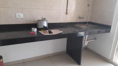 Kitchen Image of 870 Sq.ft 2 BHK Apartment / Flat for rent in VJ Yashwin SukhNiwas, Maan Pune for Rs. 25000