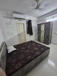 Bedroom Image of 981 Sq.ft 2 BHK Apartment / Flat for rent in Swagat Blossom, Sargasan Gandhinagar for Rs. 27000