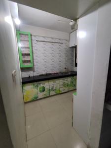 Kitchen Image of 1125 Sq.ft 2 BHK Apartment / Flat for sale in Devnandan Parisar II, Adalaj Gandhinagar for Rs. 4800000