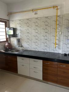 Kitchen Image of 1245 Sq.ft 2 BHK Apartment / Flat for rent in Devnandan Parisar, Adalaj Gandhinagar for Rs. 15000