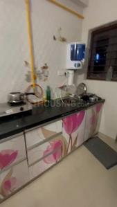 Kitchen Image of 990 Sq.ft 1 BHK Apartment / Flat for rent in LK Vrundavan Residency II, Sargasan Gandhinagar for Rs. 18500