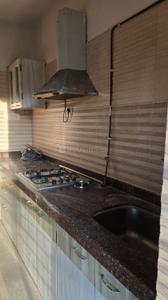 Kitchen Image of 1050 Sq.ft 2 BHK Apartment / Flat for sale in Tharwani Rosabella, Kharghar Navi Mumbai for Rs. 12000000