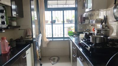 Kitchen Image of 560 Sq.ft 1 BHK Apartment / Flat for sale in Romell Empress, Borivali West Mumbai for Rs. 11500000