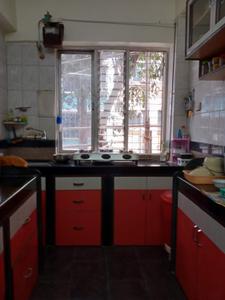 Kitchen Image of 1000 Sq.ft 2 BHK Apartment / Flat for sale in Arjun CHS, Kopar Khairane Navi Mumbai for Rs. 9800000