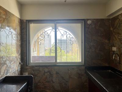Kitchen Image of 1250 Sq.ft 3 BHK Apartment / Flat for sale in Tharwani Vedant Nakshatra, Badlapur West Badlapur for Rs. 7400000