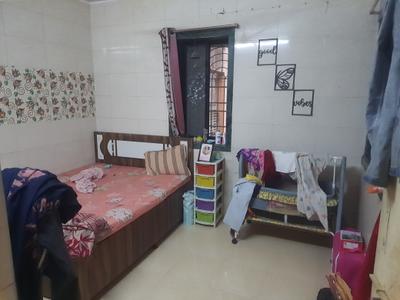 Bedroom Image of 600 Sq.ft 1 BHK Apartment / Flat for rent in Kopar Khairane Navi Mumbai for Rs. 28000