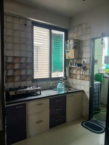 Kitchen Image of 1200 Sq.ft 1 BHK Apartment / Flat for rent in Vishvam Enclave, Shilaj Ahmedabad for Rs. 25000