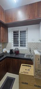Kitchen Image of 918 Sq.ft 3 BHK Apartment / Flat for rent in Urbanrise Revolution One, Padur Chennai for Rs. 35000