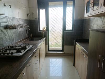 Kitchen Image of 1275 Sq.ft 2 BHK Apartment / Flat for rent in Paradise Sai Mannat, Kharghar Navi Mumbai for Rs. 55000